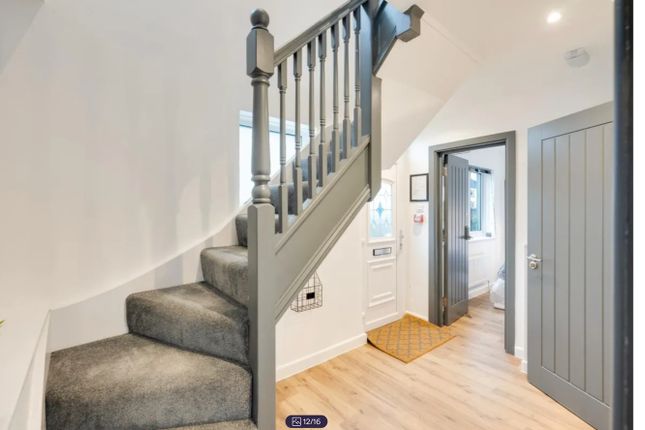 A Bright And Clean Staircase Leading To Upper Leve...