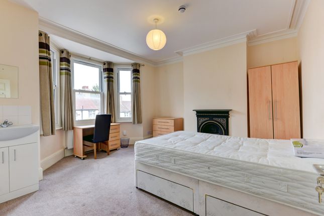 A Bright And Spacious Master Bedroom Featuring A c...