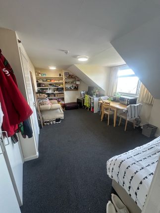A Spacious And Well-Organized Master Bedroom Featu...