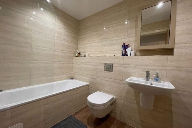 A Modern And Well-Maintained Bathroom Suite Featur...