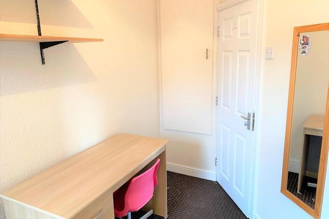 Bright And Tidy Workspace Featuring A Functional d...