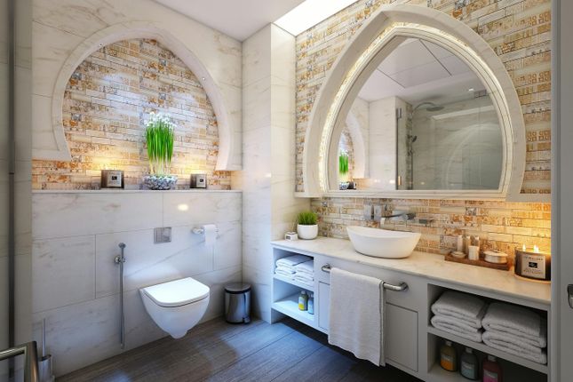 A Beautifully Designed And Well-Lit Bathroom Featu...
