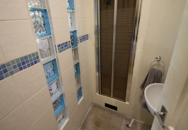 A Modern, Clean Bathroom Featuring A Large Bath, A...