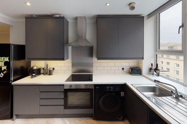 A Modern And Well-Equipped Kitchenette With Plenty...