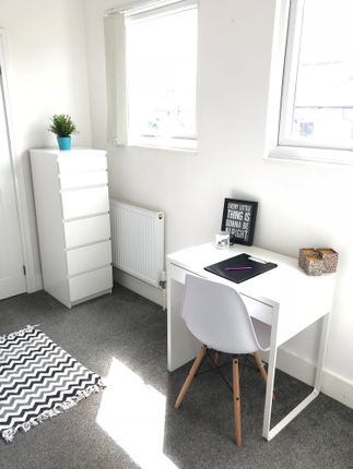 Bright And Inviting Communal Workspace Featuring A...
