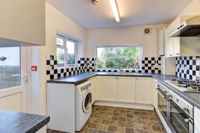 A Bright And Functional Kitchen With Ample Counter...