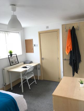 Bright And Inviting Double Bedroom Featuring A Coz...