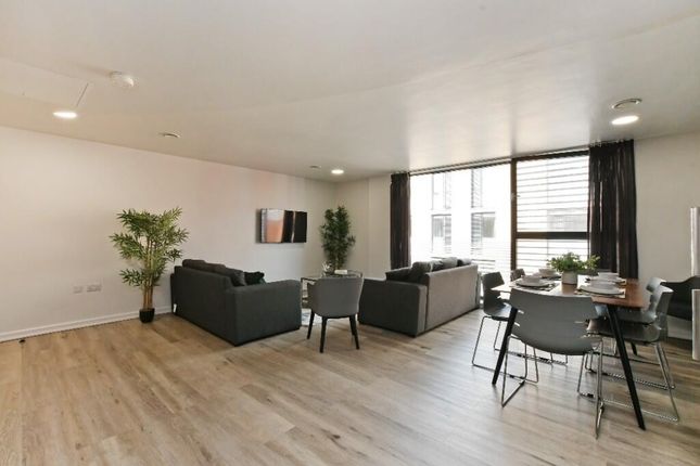 Bright And Spacious Contemporary Living Room Featu...