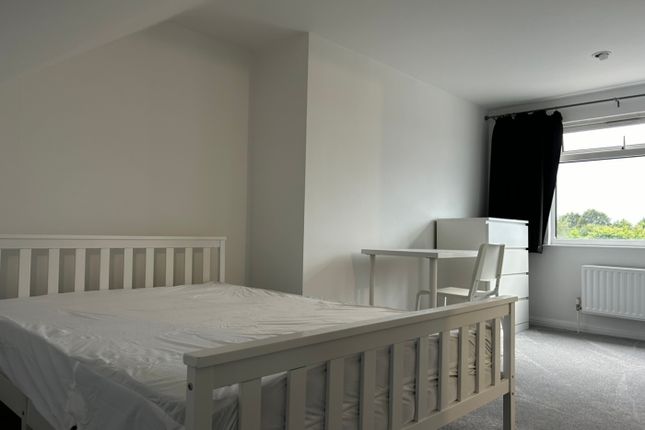 A Bright And Spacious Double Bedroom Featuring A c...