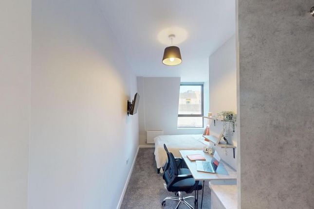 A Bright And Spacious Double Bedroom With A Comfor...