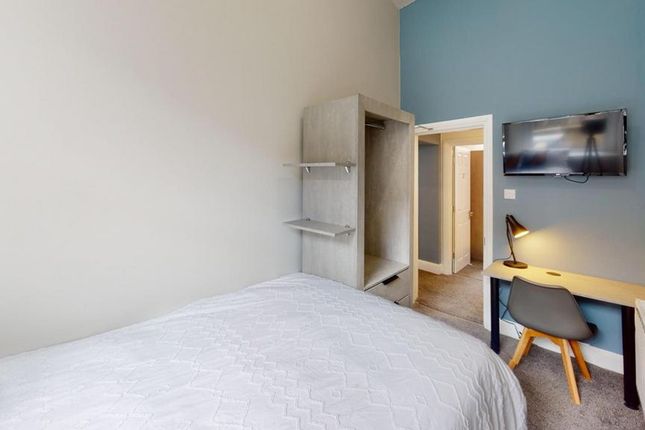A Bright And Inviting Double Bedroom Featuring Mod...