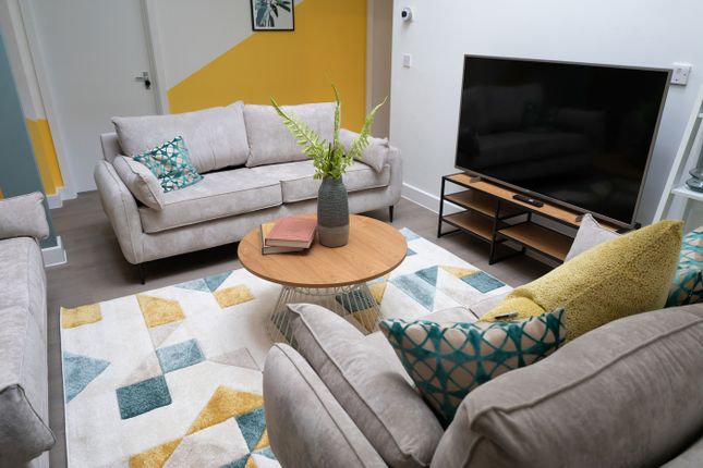 A Spacious And Inviting Modern Living Room, Perfec...