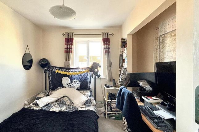 This Inviting Double Bedroom Features A Cozy Atmos...