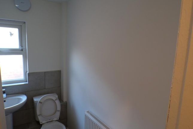 This Well-Maintained Single Toilet Features A Mode...