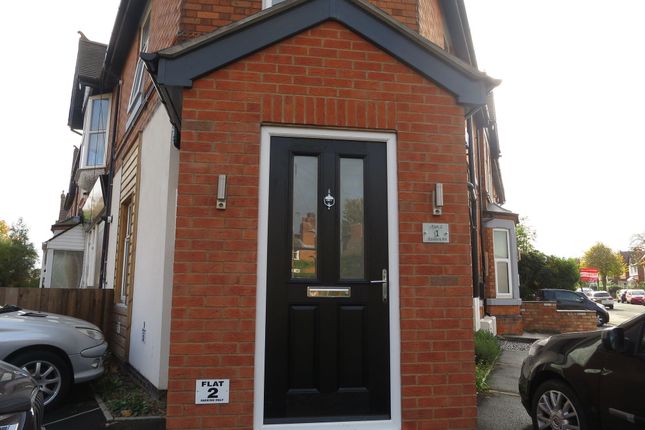 Well-Maintained Brick Front Entrance With A Stylis...