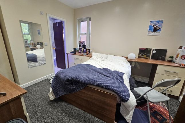 A Spacious And Well-Maintained Master Bedroom Feat...