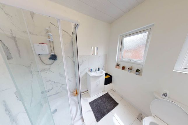 Bright And Modern Bathroom Suite Featuring A Spaci...