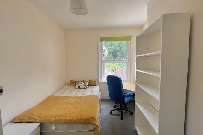 A Cozy And Inviting Double Bedroom Featuring Ample...