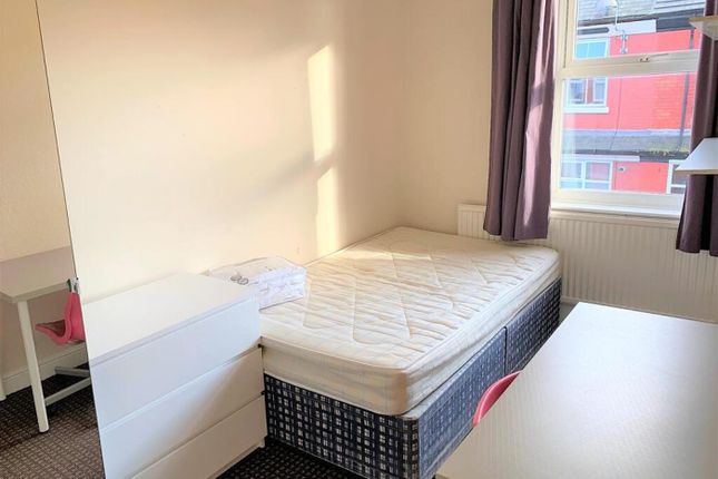 Bright And Inviting Double Bedroom Featuring A Com...
