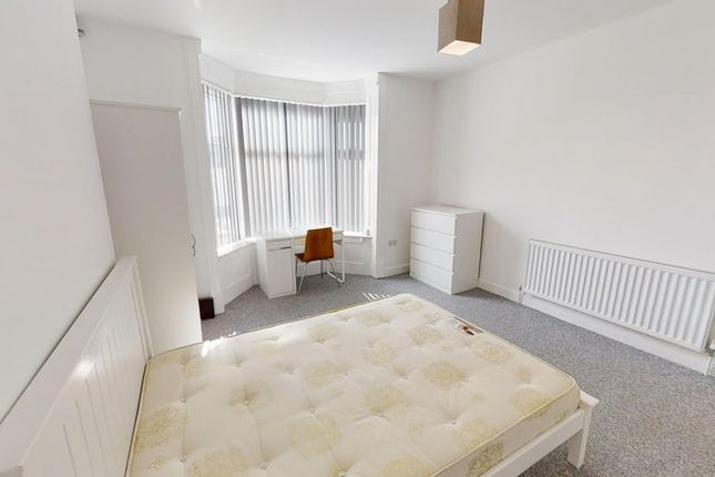 A Bright And Spacious Master Bedroom Featuring A c...