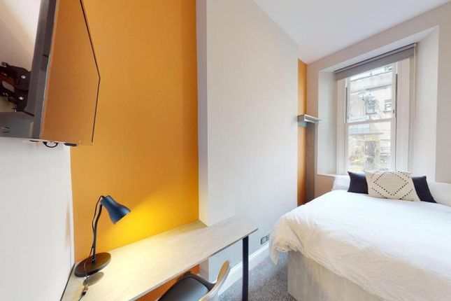 A Bright And Clean Double Bedroom Featuring A Cozy...