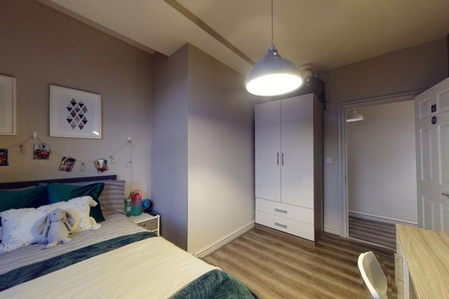 A Bright And Inviting Double Bedroom Featuring Mod...