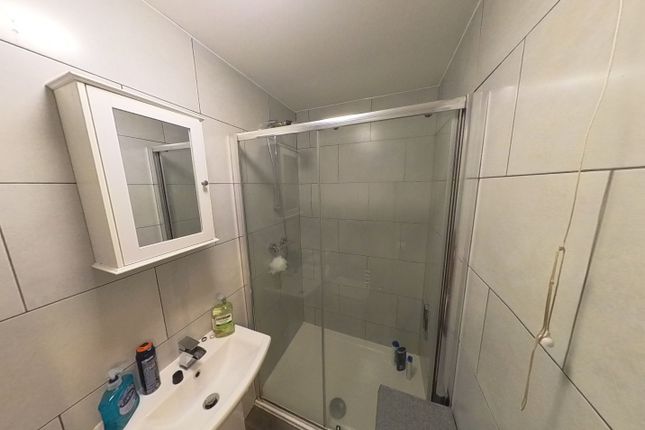 A Clean And Well-Maintained Bathroom Featuring A S...