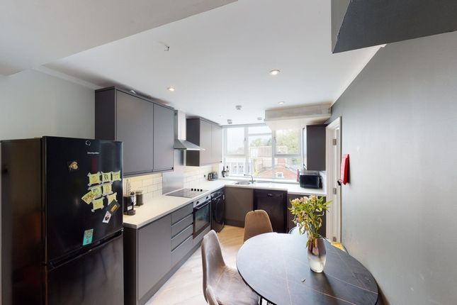 A Modern And Well-Lit Kitchenette Featuring Sleek ...