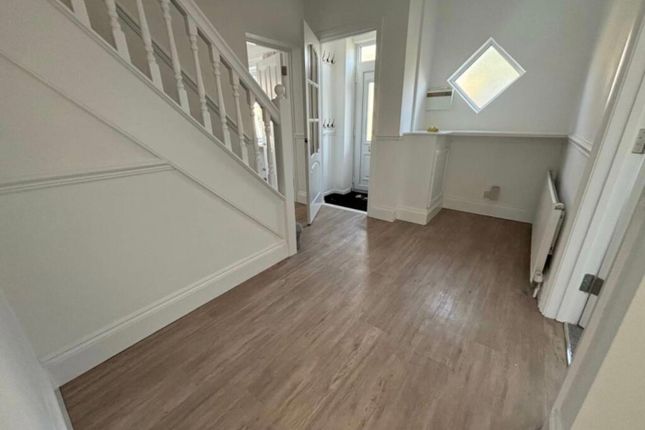 A Bright And Inviting Hallway With Modern Decor, P...