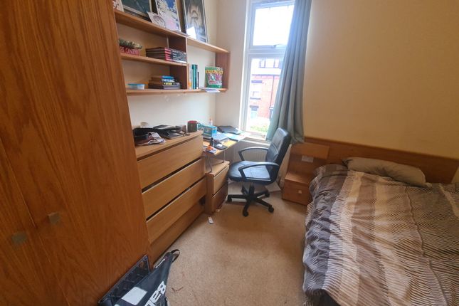 Cozy Single Bedroom Featuring A Comfortable Single...