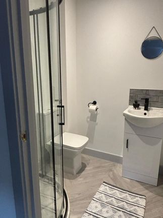 This Modern Bathroom Features A Sleek Design With ...