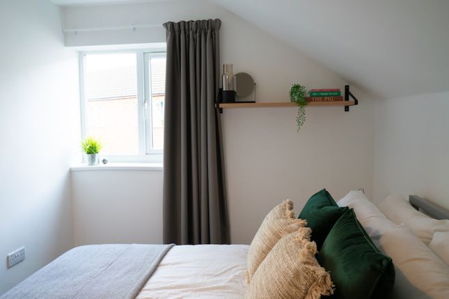 A Bright And Inviting Double Bedroom With Stylish ...