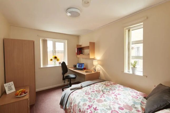 A Bright And Inviting Double Bedroom Featuring A c...