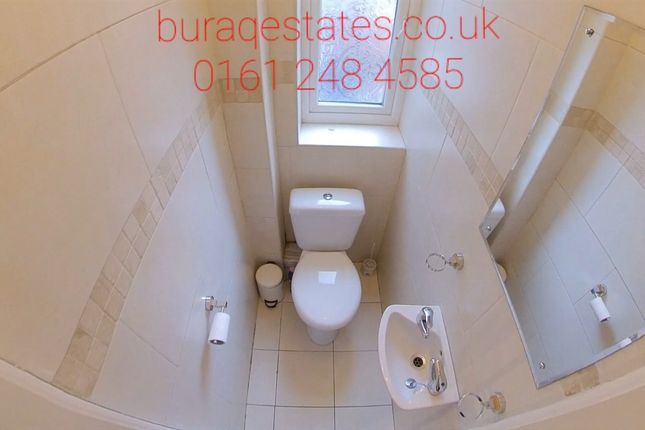 A Clean And Well-Maintained Small Toilet Room Feat...