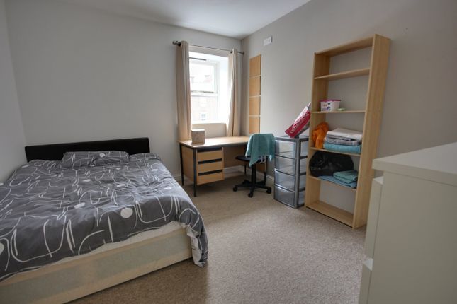 A Bright And Spacious Double Bedroom Featuring A c...