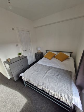 A Modern, Neatly Presented Double Bedroom Featurin...