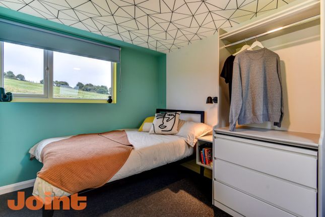 Bright And Modern Bedroom Featuring A Single Bed W...