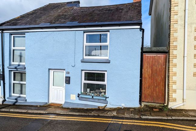 Terraced house for sale in Portway, Ferryside, Carmarthenshire.