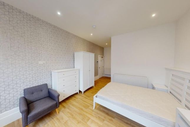 A Spacious And Bright Double Bedroom Featuring Mod...