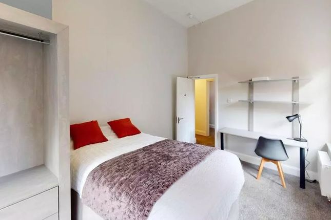 A Spacious And Inviting Double Bedroom Featuring A...