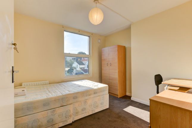 A Bright And Inviting Single Bedroom Featuring A c...