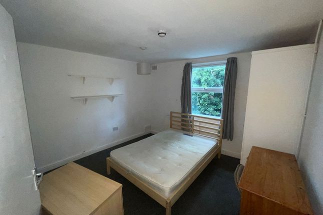 A Spacious And Bright Double Bedroom With Ample Na...