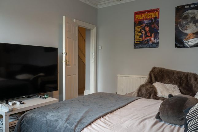 A Spacious And Well-Maintained Master Bedroom Feat...