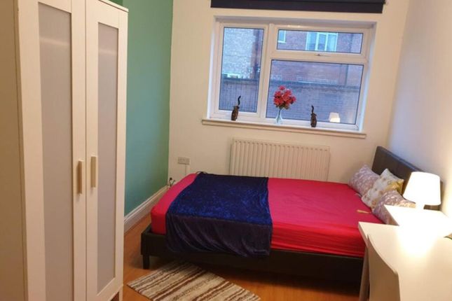 This Inviting Double Bedroom Features Ample Natura...