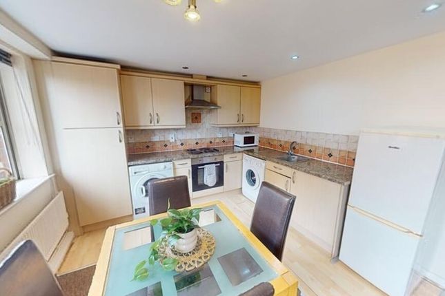 Bright And Tidy Kitchen Featuring Ample Natural li...