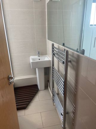 A Modern Bathroom Featuring A Clean Design With Am...