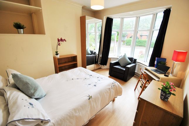 A Bright And Inviting Double Bedroom Featuring A c...
