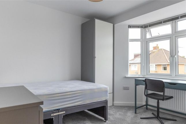 A Bright And Tidy Room Featuring A Large Window Th...