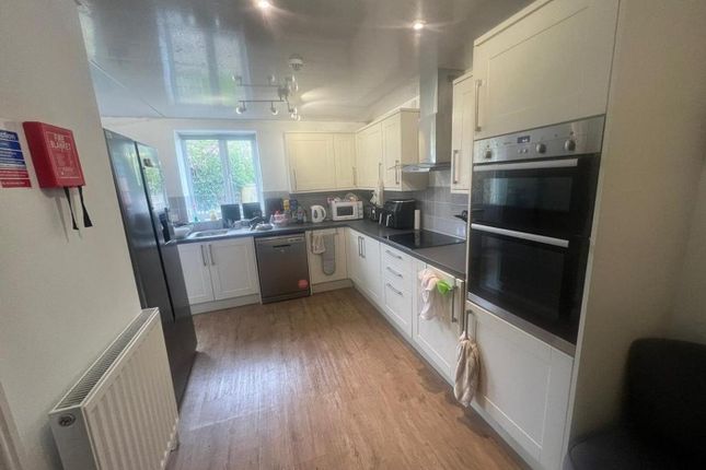 A Spacious And Modern Kitchen With Ample Natural l...