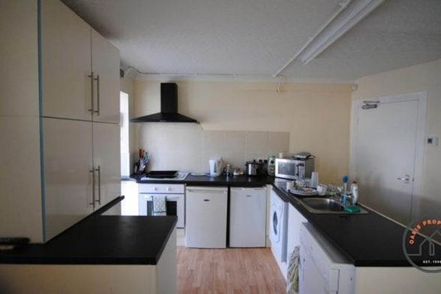 A Modern, Well-Maintained Kitchen Featuring Ample ...